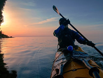 kayaker at sunset in Door County
