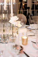 white and gold wedding table numbers