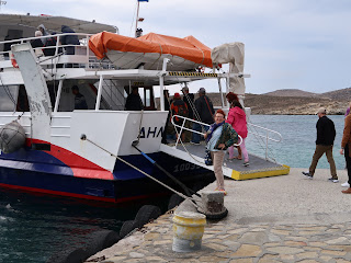 Cookie about to board a ferry after a wonderful day in Delos.