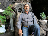 Bruce Keller relaxes on a Lanzarote volcanic rock chair.