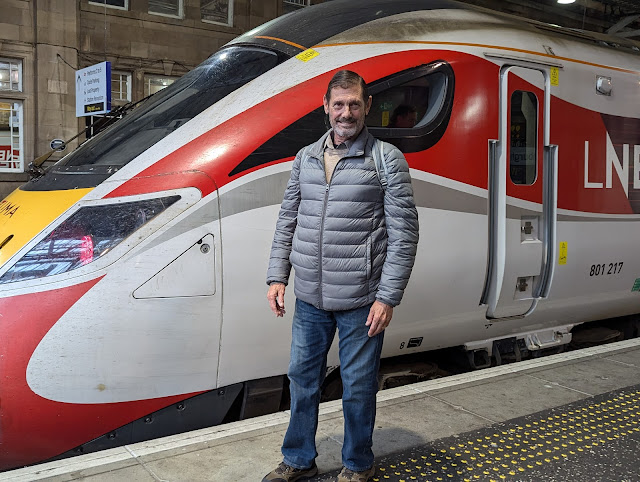 Bruce Keller poses by one of the UK's many efficient and comfortable trains. By using a BritRail pass, we were able to visit several cities during a brief trip, making the most of our time.