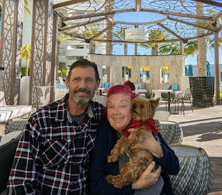 Keller and Cookie at a hotel patio during a "staycation" in San Diego