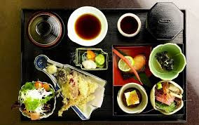 A bento box often contains soup, salad or pickles, sushi and tempura.