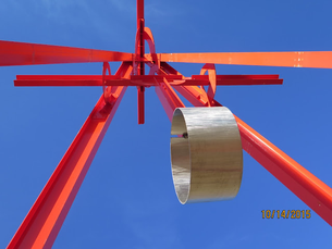 The piece is "Proverb," by Mark di Suvero 