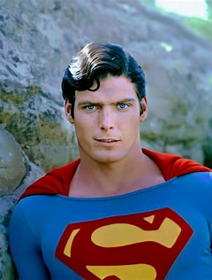 Close-up of actor Christopher Reeve as Superman in the character's blue suit and red cape