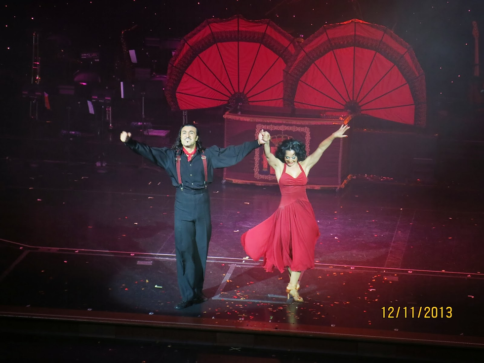 For this couple, the world's great cruise ship lines offer opportunity to perform magic, dancing, and other treats.
