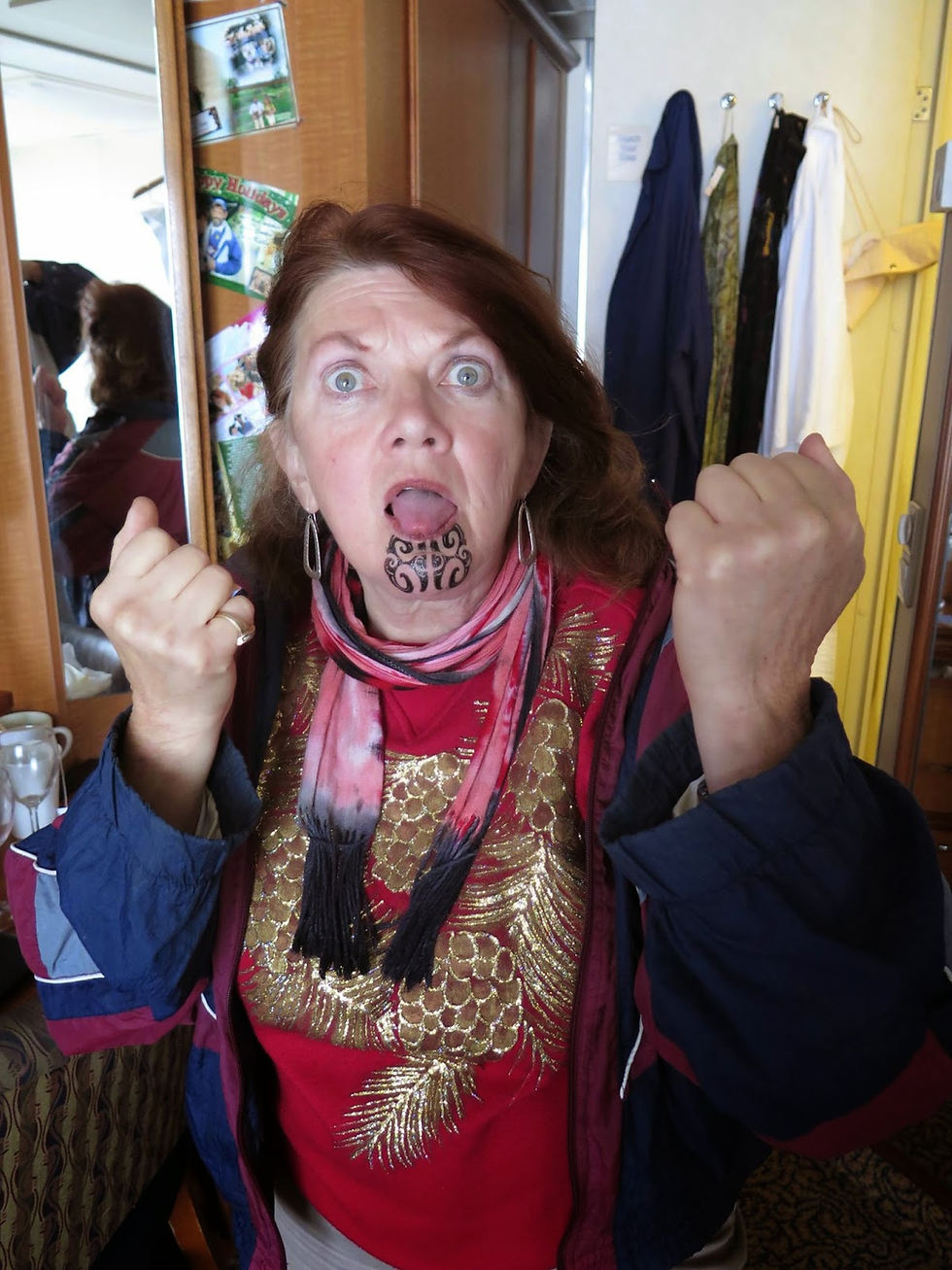 A Maori tattoo was given to Cookie for her heroism in a stick game at a New Zealand village.
