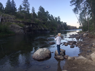 Michael Toia casts off on the West Fork of the Stillwater River. He is an excellent avid fisherman, too. Both fishing and his piano tuning draw on his perfectionism and patience.