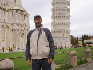 Keller posing at Tuscan Landmark the tower of Pisa