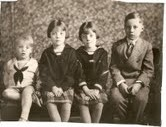 Harry A. Cosgriffe, above right, poses with his siblings, circa 1930. From left, Richard