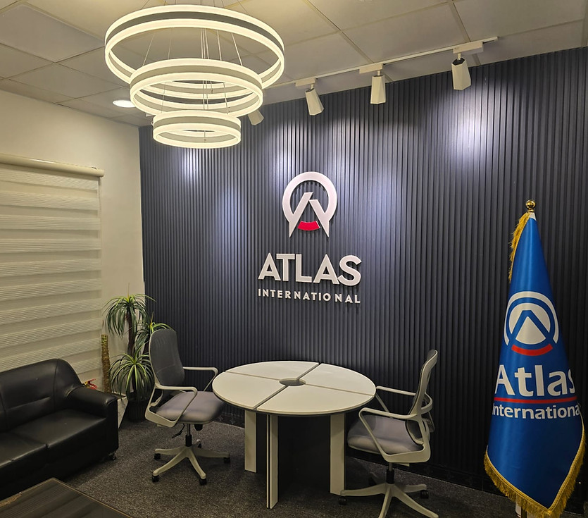 ATLAS International office with logo and meeting table