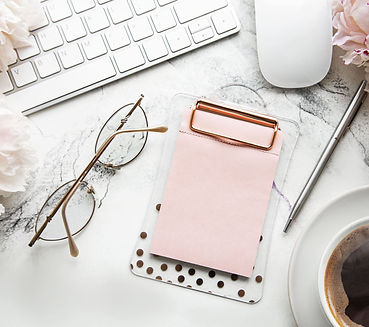 flat-lay-top-view-womens-office-desk-with-flowers.jpg