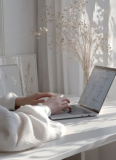 someone-is-typing-laptop-white-table(1).jpg