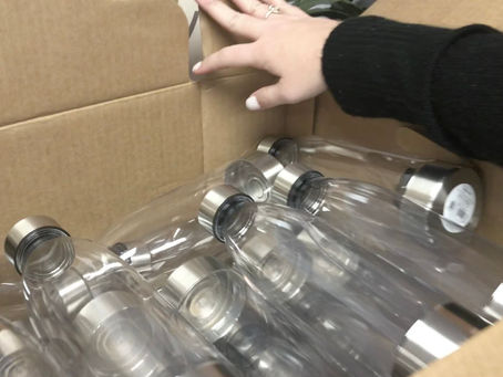Junior Auxiliary donates water bottles to LCSD