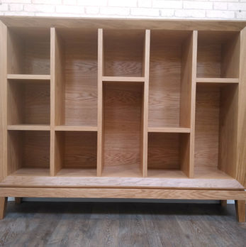 Book matched Oak Veneer Unit with Bevel Frame.
Finished in Satin Lacquer