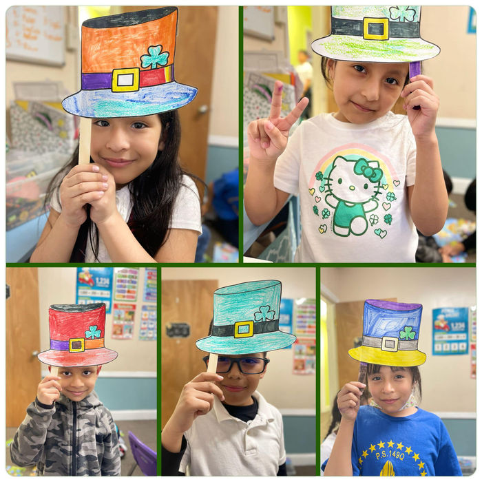 A collage of kindergartners holding their St. Patrick's Day paper crafts.