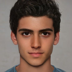 A teenage boy. Tanned, dark brown hair, dark brown eyes.