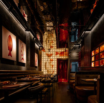 Applelec Projects bespoke L-shaped illuminated lightbox with fish artwork at Sole Club Glasgow hospitality venue