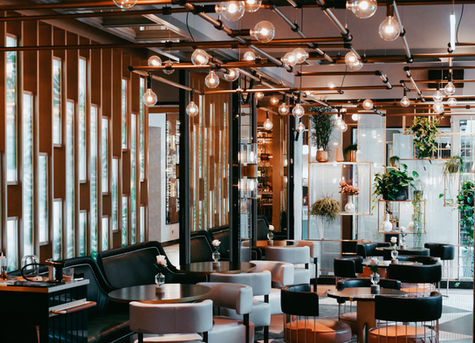 Double-sided illuminated feature using Applelec LED Light Sheet for ambient bar lighting