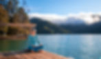 Blenheim Radiant Body Yoga instructor Charlotte Patterson relaxes with her journal in the Marlborough Sounds