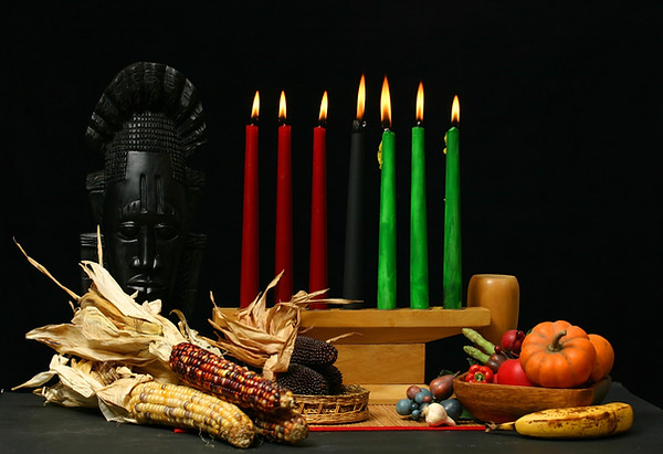 Kwanzaa display with candles lit.jpg