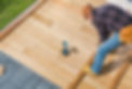 men-building-wooden-deck-on-his-backyard-2021-08-28-22-28-46-utc.jpg