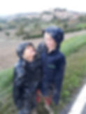 A picture of Limor's two boys in a rainy day in Italy