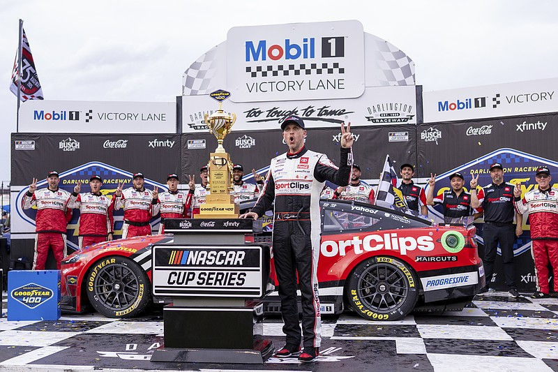 Denny Hamlin celebrates his win in the Goodyear 400 at Darlington Raceway. (Photo: Jim Dedmon, Imagn Images).
