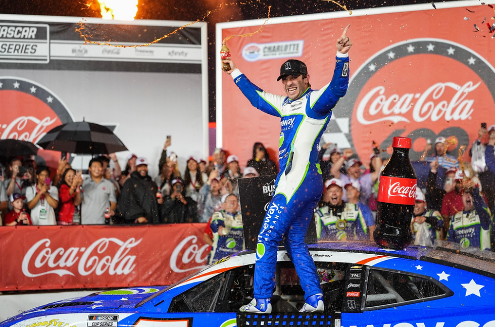 Daniel Suarez celebrates in victory lane after winning the 2026 Coca-Cola 600! (Photo: Matt Kelly/AP)