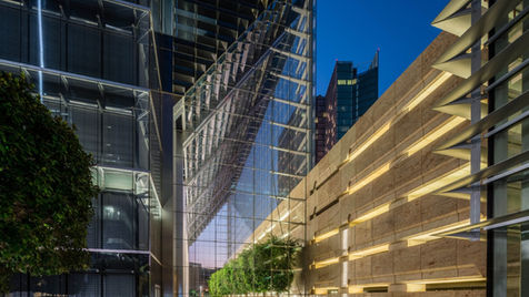 Contemporary glass architecture during evening twilight