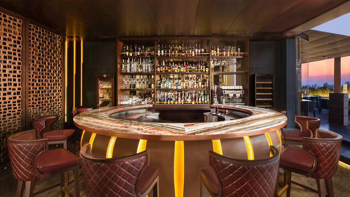 Stylish bar with illuminated circular counter.