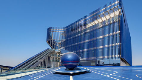 DP World Flow Pavilion with flowing facade and kinetic panels.