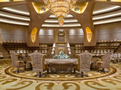Elegant conference room with large chandelier and luxurious interior