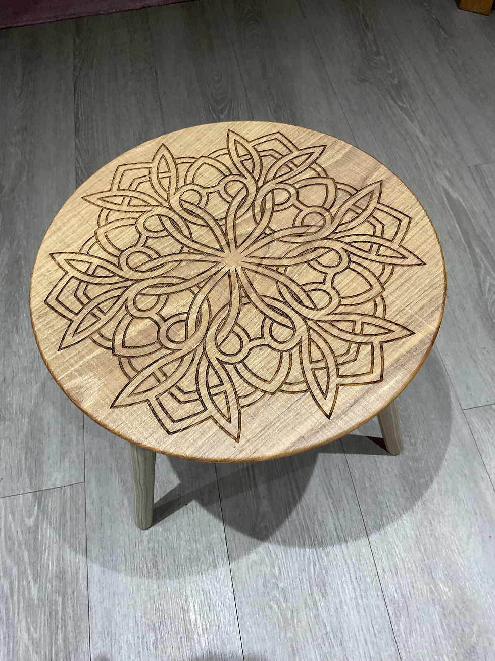 Thumbnail: small round coffee table showing engraving pattern
