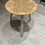 Thumbnail: small round coffee table showing engraving pattern