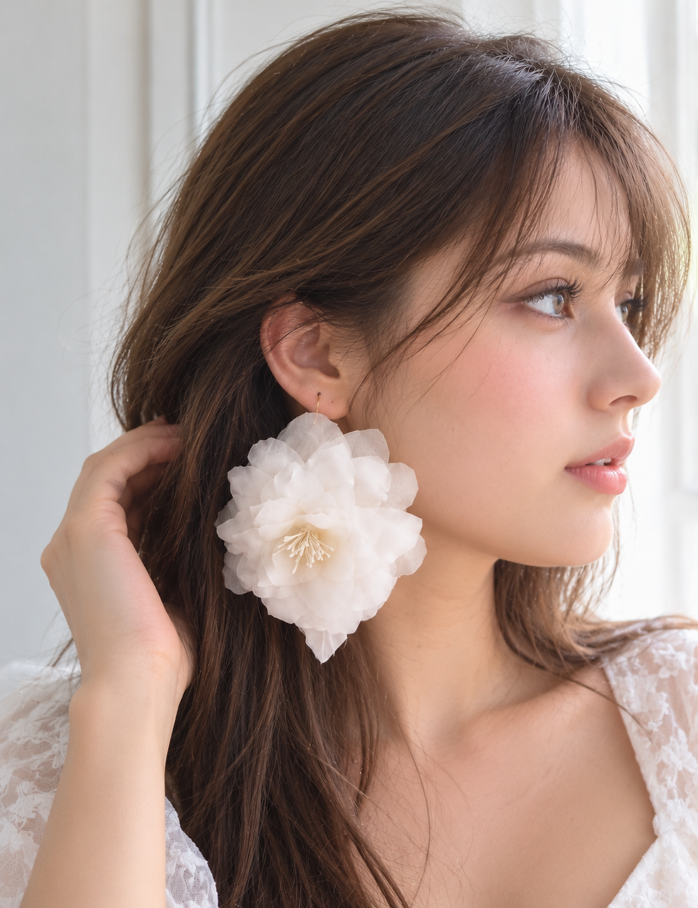 Thumbnail: boucles d'oreilles fleurs blanche