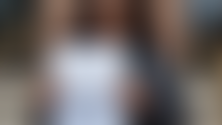 Woman holding a layoff letter, symbolizing career loss, resilience, and the power of a growth mindset to turn setbacks into new opportunities.