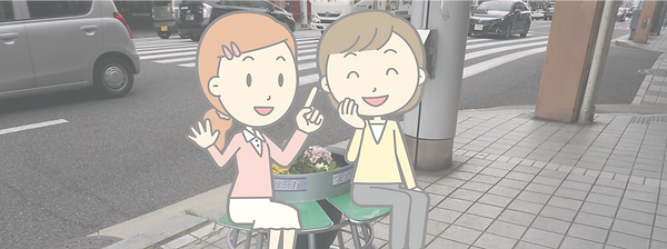 通りで話す二人