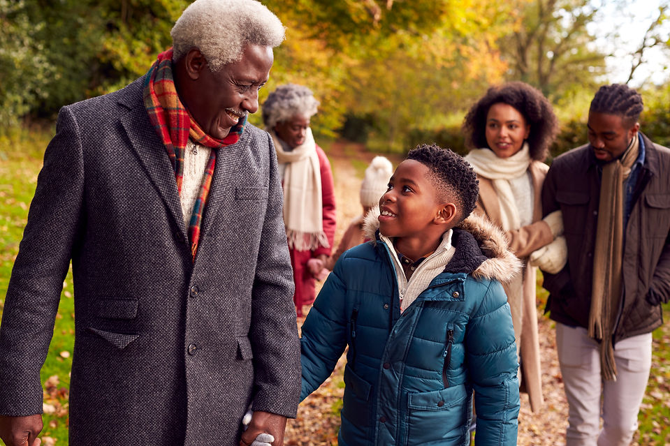 smiling-multi-generation-family-having-fun-walking-2024-10-21-22-04-53-utc.jpg