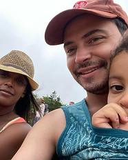 First employee Franz posing with family