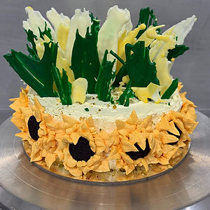 7" carrot cake with sunflower theme decoration