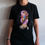 Thumbnail: Picture of girl wearing STATUE T-SHIRT