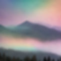 rainbow clouds over misty mountains