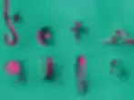 Arte em recorte em papel escrito Sotaque nas cores verde e rosa.