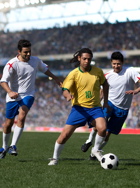 Playing Soccer in Stadium.jpg
