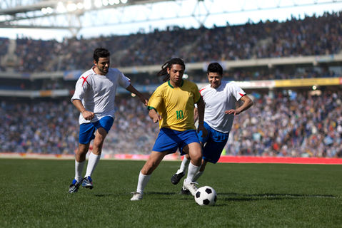 Playing Soccer in Stadium.jpg