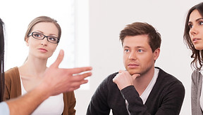 Group therapy session: Man leads discussion