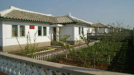 Huizen van de Mingok Coöperatieve Boerderij