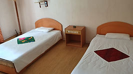 Slaapkamer van hotel in Samjiyon