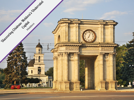 Triumphal Arch with a clock in central Chișinău, Moldova, with a church bell tower visible in the background. The scene is set on a clear day with trees and power lines framing the area. Text overlay in the top left corner reads "Discovering Chisinau: Moldova’s Underrated Capital."